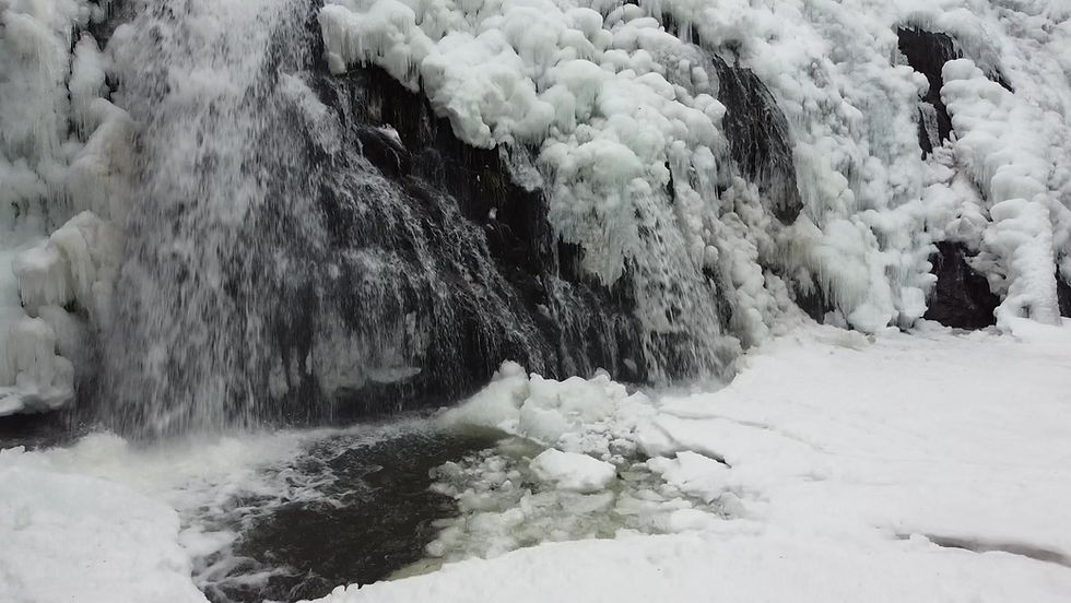 Drone video reveals ice-encrusted Christie Falls on Bush Creek